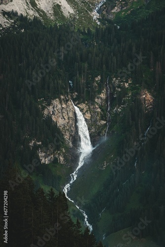 Beautiful closeup of a waterfall  streaming through the mountain cliff