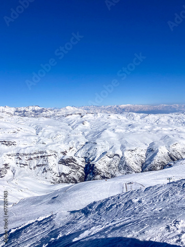 Wallpaper Mural A dazzling winter scene, with a snowy mountain dominating the landscape of a lively ski center. Torontodigital.ca