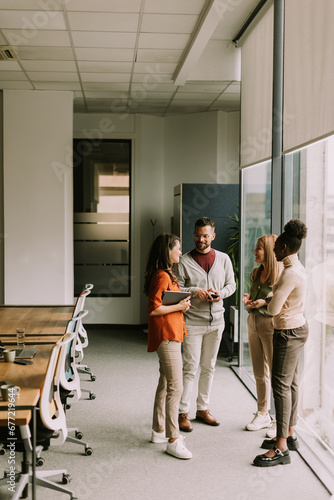 Young multiethnic startup team working in the modern office