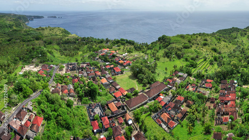 Panoramic aerial view of Tanglad village on sunny day. Nusa Penida Island, Indonesia. photo