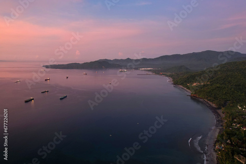 Aerial view of Manggis Bay at sunrise. Bali, Indonesia.