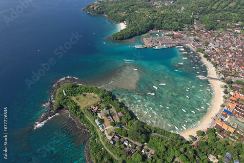 Aerial view of Pura Luhur Silayukti hindu temple and Padangbai bay on sunny day. Manggis, Bali, Indonesia.