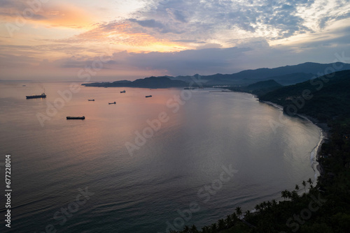 Sunset aerial view of Manggis Bay. Bali, Indonesia.