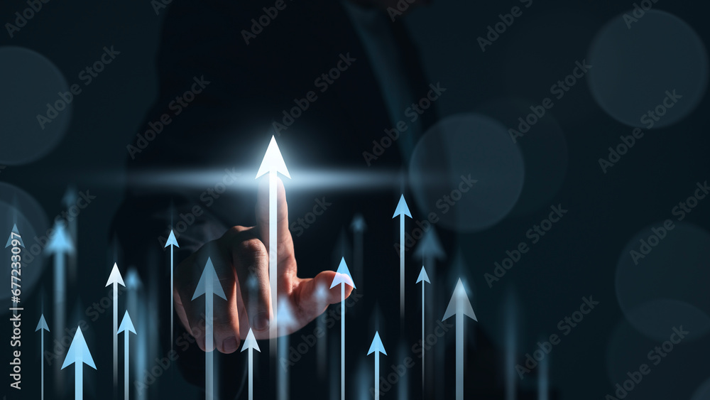 Hand pointing growth arrow success business target background of up ...
