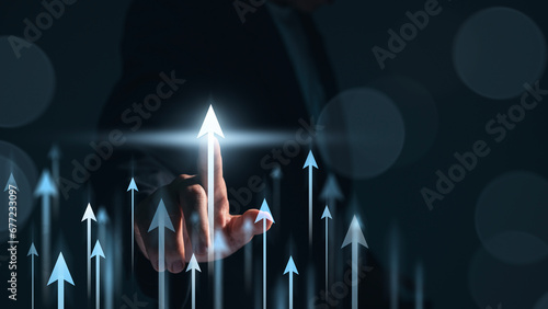 Hand pointing growth arrow success business target background of up icon direction development graph or investment finance profit stock market chart symbol and goal achievement on economy marketing photo