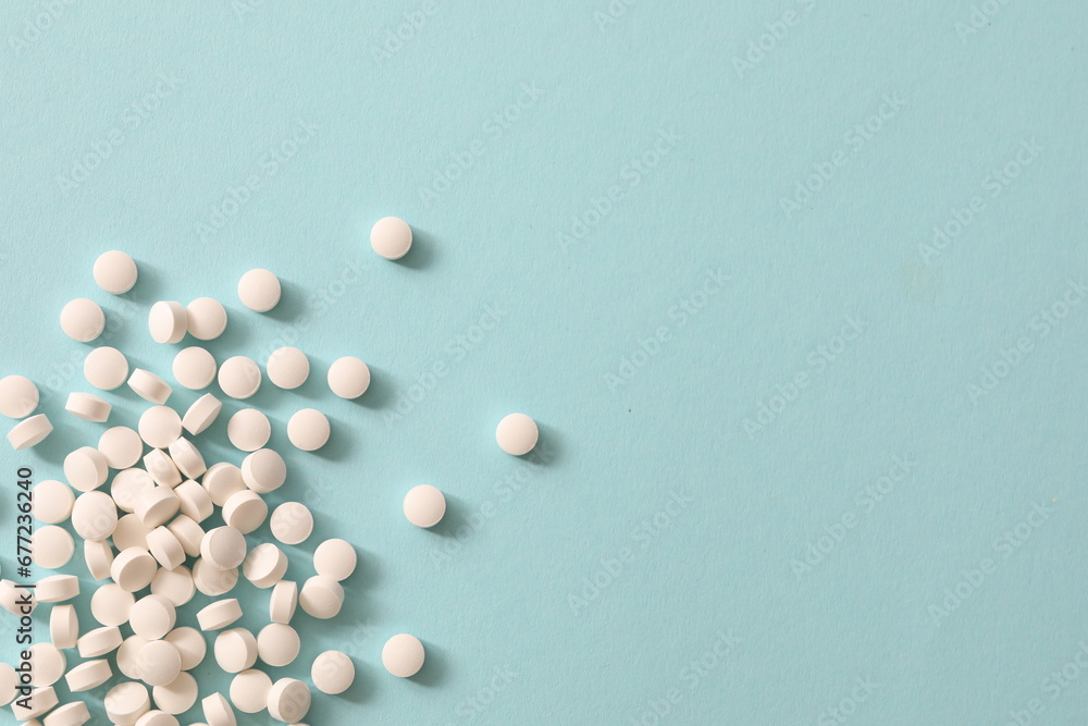 white pills on white background white pills on white background