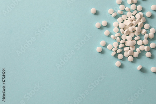 pills on a blue background photo