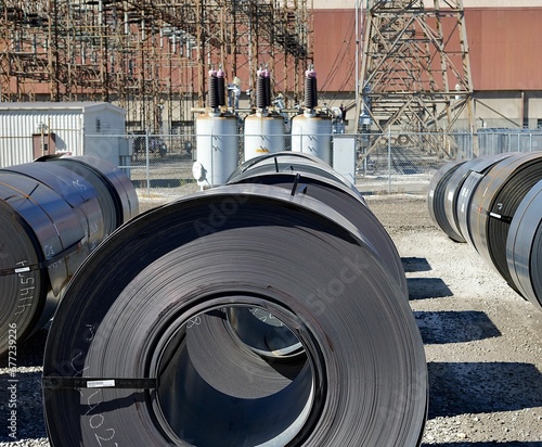 Closeup shot of steel coils on a sunny day in an industrial site