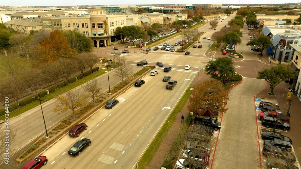 Aerial view of the cars driving on the city roads in Dallas, Texas, the United States