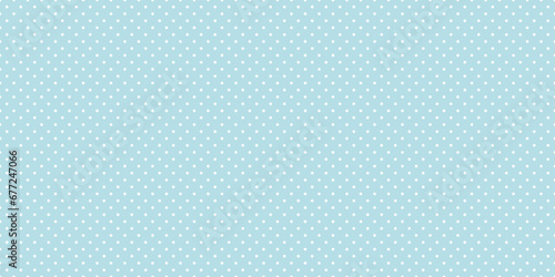 Seamless white polka dot pattern on blue background photo