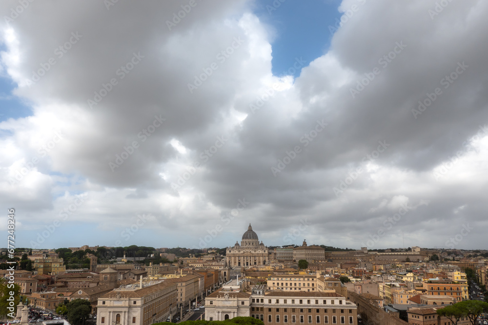 Rome, Italy, Vatican. Grey white dark clouds over the ancient city. St Peter's basilica dome before the rain. Travelling to Europe, famous touristic place