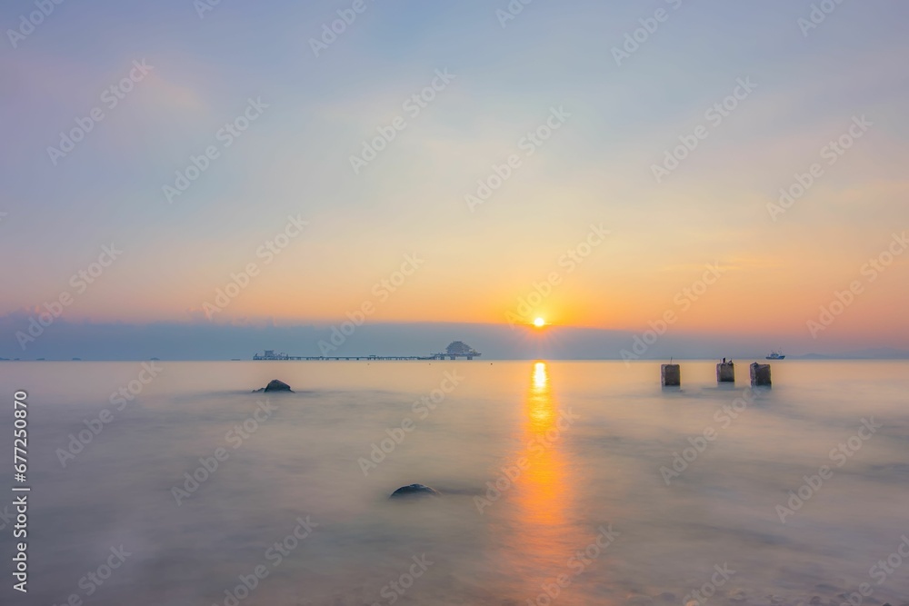 Long exposure of a sunset over the sea.