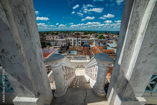 Vászonkép High angle shot of white stairs leading down to Cienfuegos city in Cuba