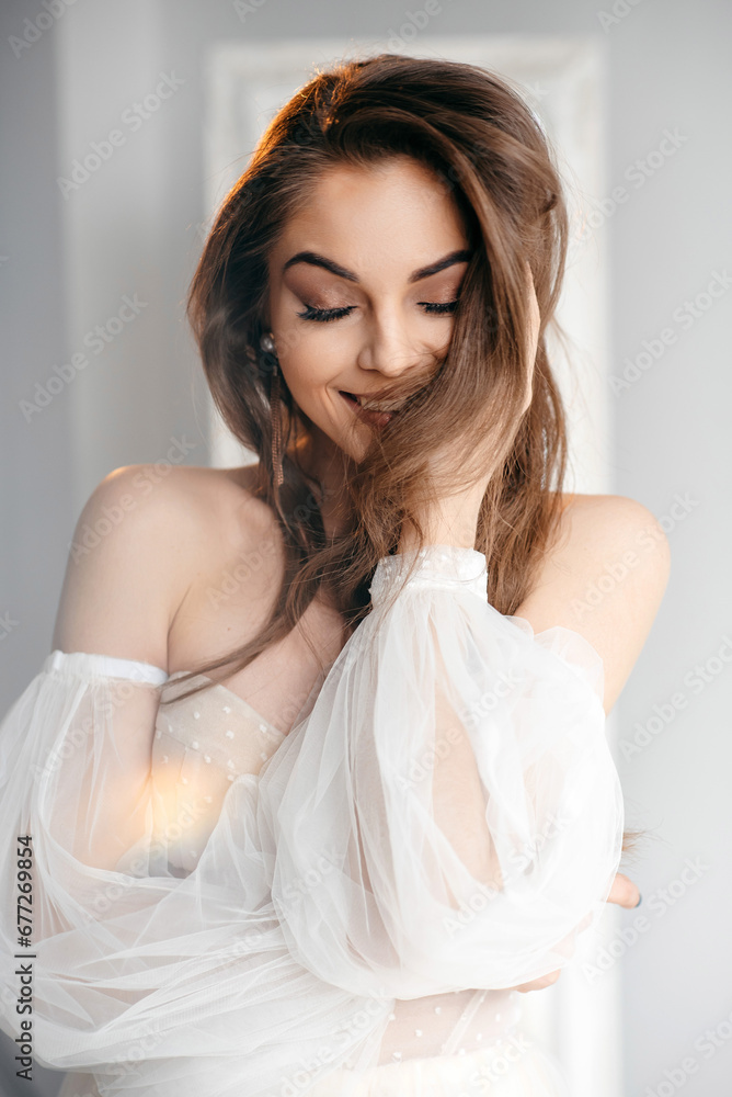 Romantic beautiful bride in white dress posing with closed eyes Romantic beautiful bride in white dress posing with closed eyes