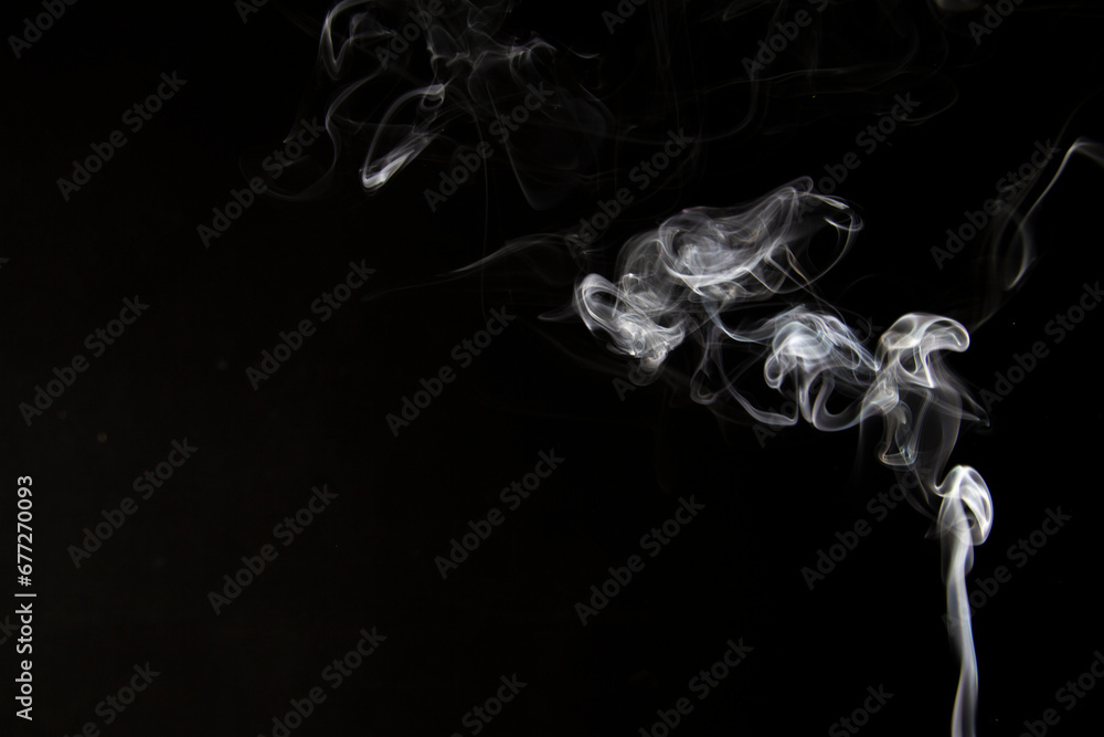 White Smoke Cigarette in Dark Background