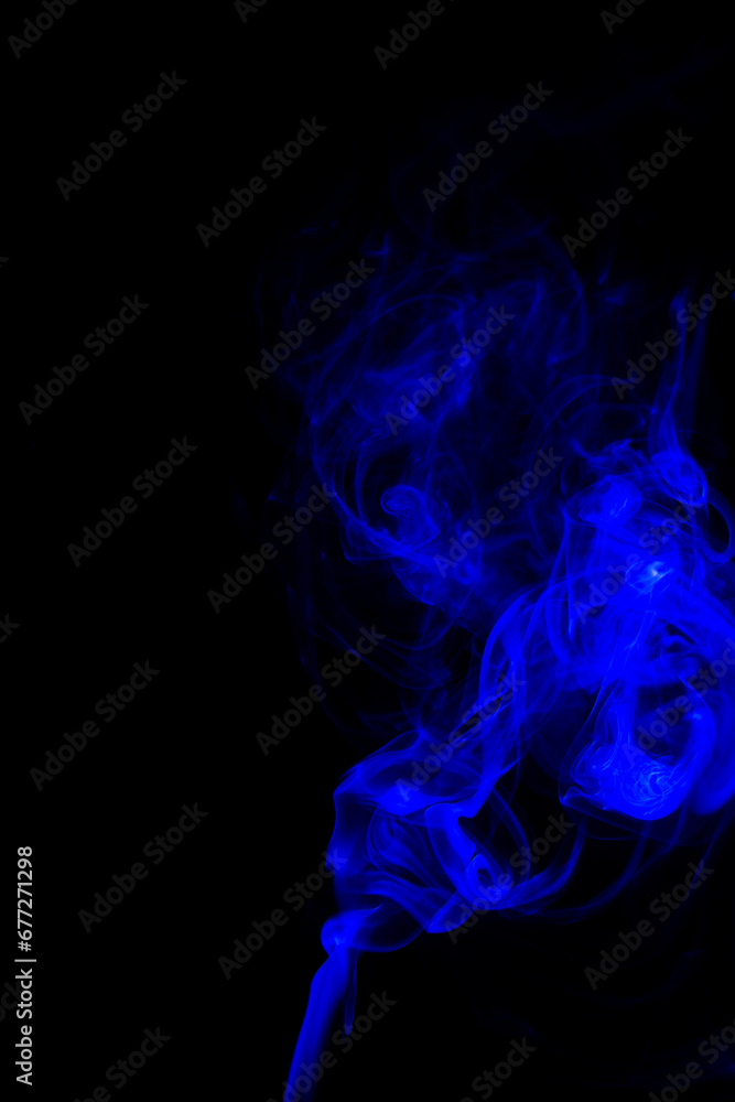 blue Smoke in cigarette in dark Background blue Smoke in cigarette in dark Background