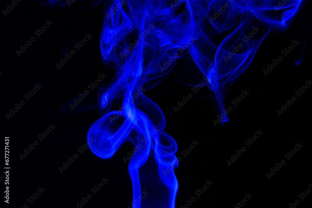 blue Smoke in cigarette in dark Background blue Smoke in cigarette in dark Background