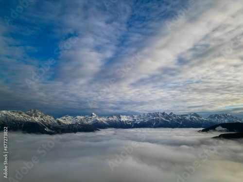 Aerial view of cloudscape over mountain landscape in the countryside