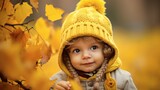 little baby in sunny autumn park