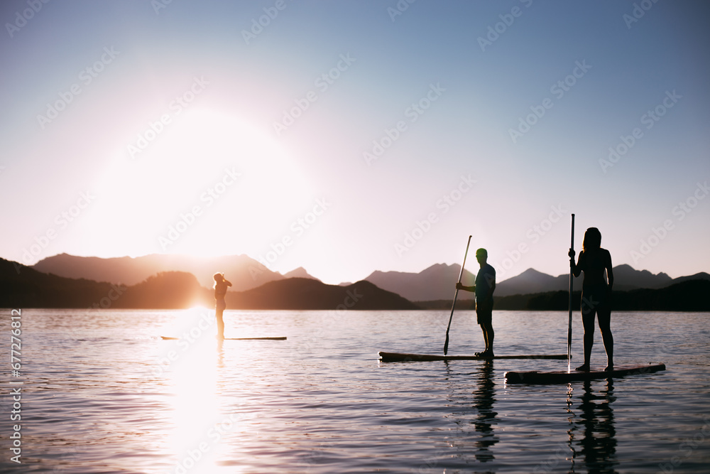 Fototapeta premium siluetas stand up paddle
