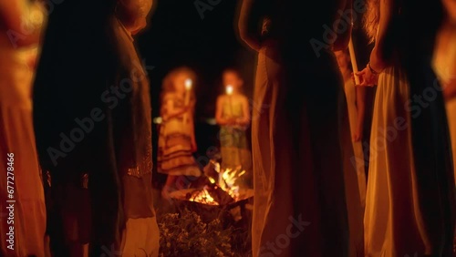 Women at the night ceremony. Ceremony space. Loop Animation.,