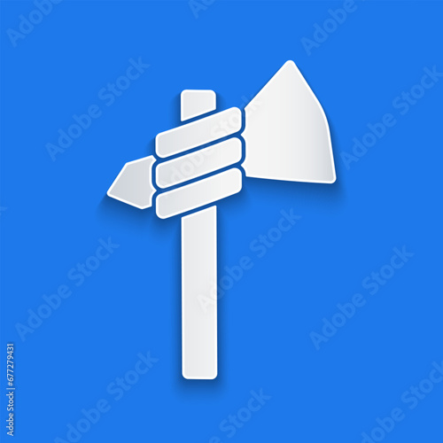 Paper cut Native american tomahawk axe icon isolated on blue background. Paper art style. Vector