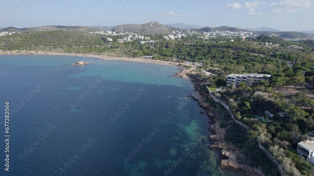 Aerial view of a sea with mountains in the background Aerial view of a sea with mountains in the background