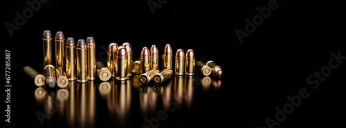 Bullet isolated on black background with reflexion. Cartridges for rifle and carbine on a black. Rifle bullets close-up on black back.