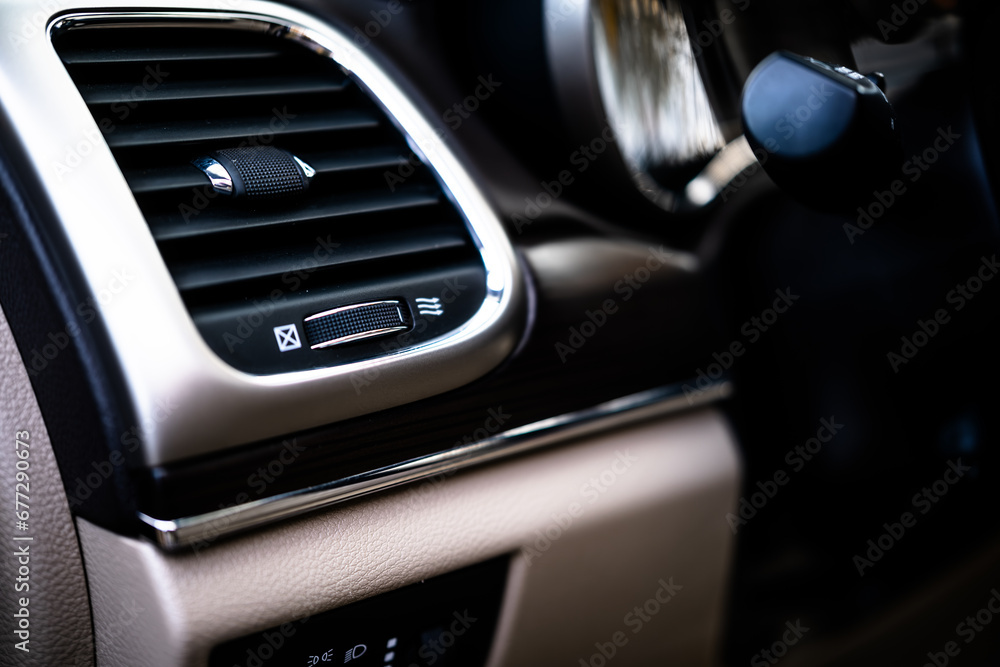 Car air conditioning vent grille close up