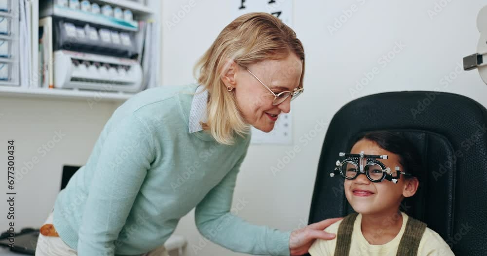 Vision, optometry and optician with frame for child for test, sight and glasses for eye exam. Healthcare, medical equipment and young patient consulting with woman for prescription lens in clinic Vision, optometry and optician with frame for child for test, sight and glasses for eye exam. Healthcare, medical equipment and young patient consulting with woman for prescription lens in clinic