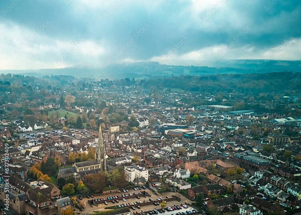 Aerial view of a cityscape under a gloomy sky