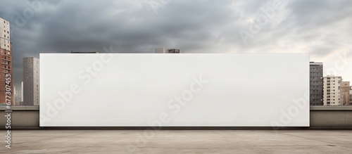 Blank billboard on construction site next to unfinished building Copy space image Place for adding text or design photo