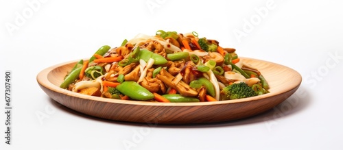 Bamboo place mat with mix of stir fried vegetables a vegan dish Copy space image Place for adding text or design