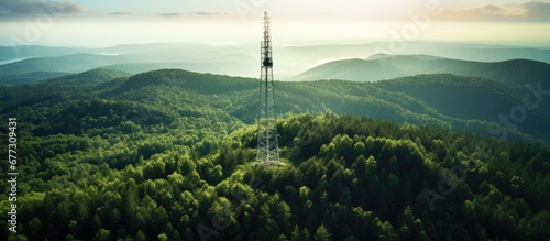 Bird s eye view of cellphone tower in rural West Virginia forest to show absence of broadband internet Copy space image Place for adding text or design photo