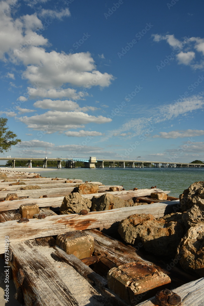Vertical shot of the tranquil sea captured from the pier in Anna Maria Island, Florida Vertical shot of the tranquil sea captured from the pier in Anna Maria Island, Florida