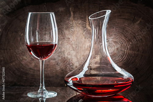 Wineglasss And Decanter With Red Wine On Vintage Wood Background