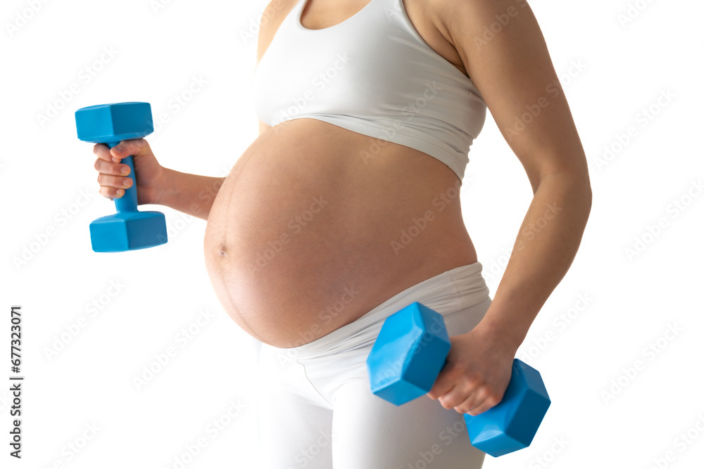 Side angle shot of unrecognizeable pregnant mother with round baby bump in white sports wear and working out with arm weights. Last month of pregnancy - week 39. White background. Bright shot. Side angle shot of unrecognizeable pregnant mother with round baby bump in white sports wear and working out with arm weights. Last month of pregnancy - week 39. White background. Bright shot.