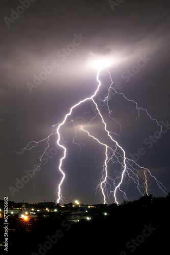 Beautiful Lightning bolt strike Over Kempton Park, Stunning and dangerous power energy that exists in nature as a storm passes over with heavy rain fall and storms