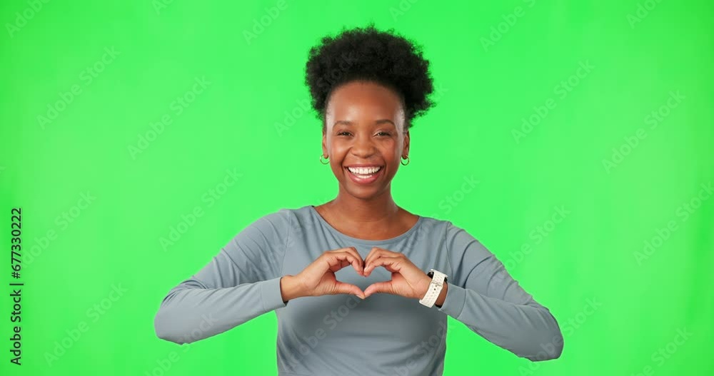 Black woman with smile on face, heart hands and green screen with care, kindness or gesture. Thank you, like and happy girl with love hand sign, emoji or icon on isolated on color background portrait Black woman with smile on face, heart hands and green screen with care, kindness or gesture. Thank you, like and happy girl with love hand sign, emoji or icon on isolated on color background portrait