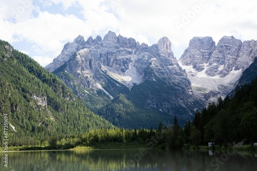Landscape with lake in mountains in Dolomites, Italy © Wirestock