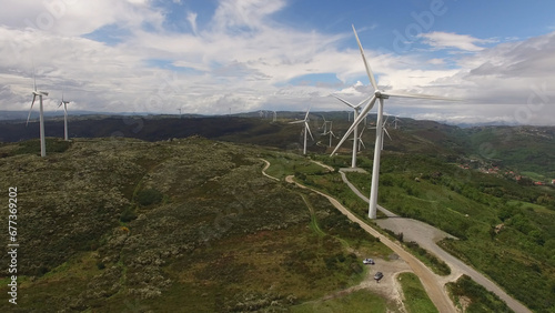 Aerial Photography of Windmills in the Mountains. Alternative energy. Fafe, Portugal photo