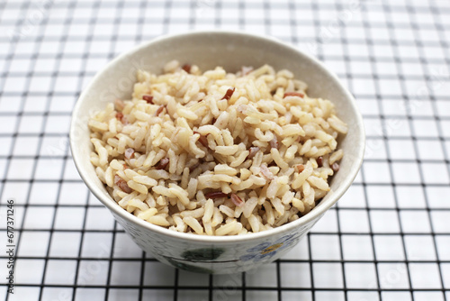 Cooked brown rice in bowl