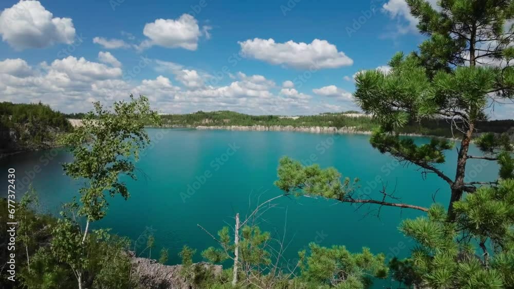 Lake landscape with turquoise water summer sunny day Lake landscape with turquoise water summer sunny day