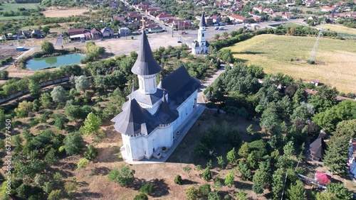 Aerial shot of Gai Monastery on a sunny summer day in Arad, Romania photo