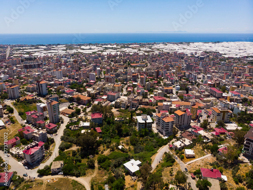 Aerial cityscape of Turkey city Anamur on the mediterranean sea shore photo