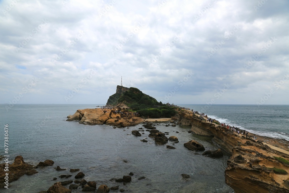 Landscape of the Yehliu Geopark surrounded by the sea on a gloomy day in New Taipei City, Taiwan
