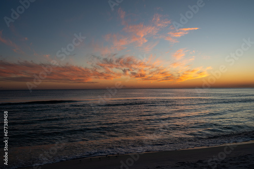 Colorful evening cloudscape after sunset over Gulf of Mexico off Panama City Beach, Florida.