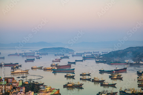 Xiaoruo Village, Wenling City, Taizhou City, Zhejiang Province - high angle view of fishing village and fishing port at sunrise