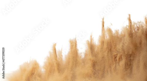 Blur Defocus image of Small Fine Sand flying explosion, Golden grain wave explode blow. Abstract sands cloud. Yellow colored sand splash storm up in Air. White background Isolated freeze