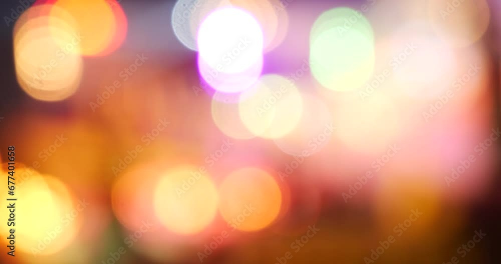 Colorful Bokeh abstract blurred background music festival stage show performance party. Vibrant bokeh background spark animate motion. Backdrop display with twinkling night life shape blinking light